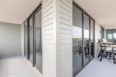 Experience elevated coastal living in this beautifully appointed