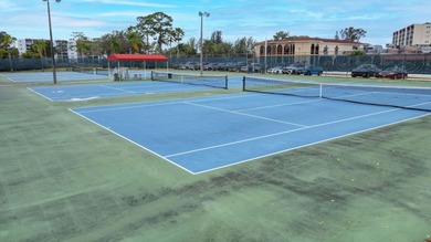 Welcome to this spacious first-floor condo, perfectly situated