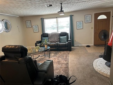 This 5-bedroom, 2-bathroom wheelchair-accessible home features a