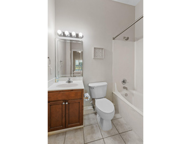 Set on Navarre Beach's iconic shoreline, Unit 105 at The Inn at