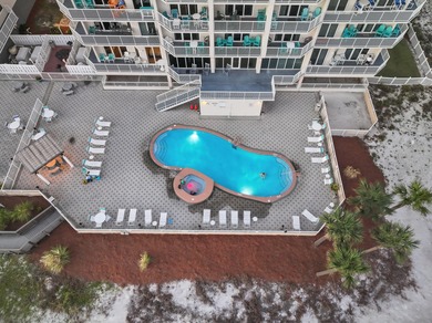 Set on Navarre Beach's iconic shoreline, Unit 105 at The Inn at