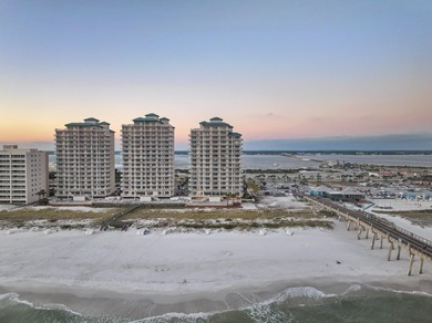 Set on Navarre Beach's iconic shoreline, Unit 105 at The Inn at