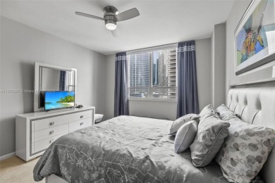 Experience the privacy and charm of Brickell Key in this 1 bed /