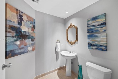 Experience the privacy and charm of Brickell Key in this 1 bed /