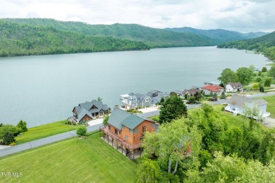 SPECTACULAR HOME WITH 2 FIREPLACES, ELEVATOR, 5 CAR GARAGE, LAKE