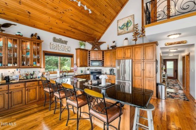 SPECTACULAR HOME WITH 2 FIREPLACES, ELEVATOR, 5 CAR GARAGE, LAKE