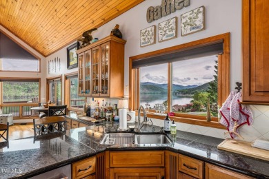 SPECTACULAR HOME WITH 2 FIREPLACES, ELEVATOR, 5 CAR GARAGE, LAKE