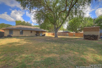 Nestled at the end of a quiet cul-de-sac, this 4-bedroom, 2-bath