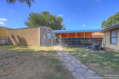 Nestled at the end of a quiet cul-de-sac, this 4-bedroom, 2-bath