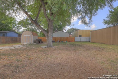 Nestled at the end of a quiet cul-de-sac, this 4-bedroom, 2-bath