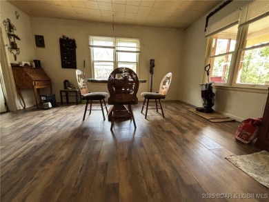 Start your Lake of the Ozarks adventure with this 1960 home full