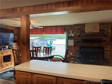 ***Huge PRICE REDUCTION*** Rare find *Level* Lakefront home sits