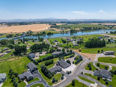 Nestled near the Greenbelt and Snake River, this meticulously