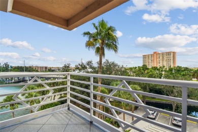 Enjoy luxury waterfront living in this premier fourth floor end