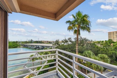 Enjoy luxury waterfront living in this premier fourth floor end