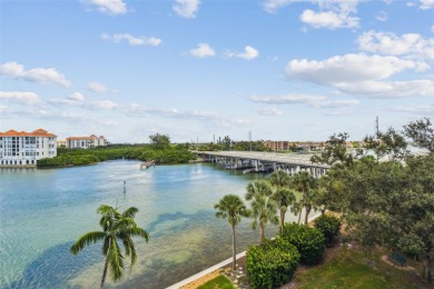 Enjoy luxury waterfront living in this premier fourth floor end