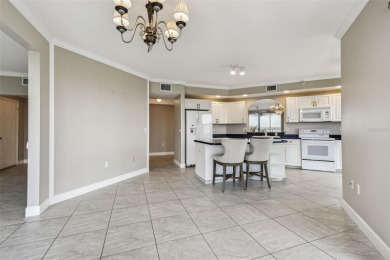 Enjoy luxury waterfront living in this premier fourth floor end