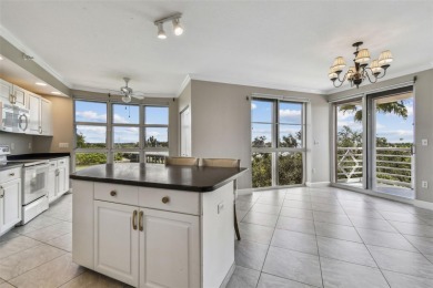 Enjoy luxury waterfront living in this premier fourth floor end