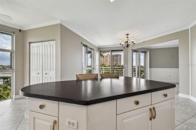 Enjoy luxury waterfront living in this premier fourth floor end