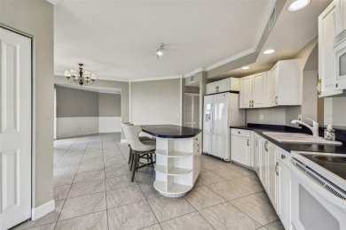 Enjoy luxury waterfront living in this premier fourth floor end