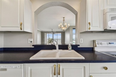 Enjoy luxury waterfront living in this premier fourth floor end