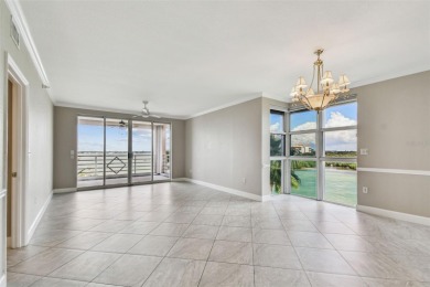 Enjoy luxury waterfront living in this premier fourth floor end