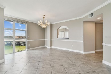 Enjoy luxury waterfront living in this premier fourth floor end