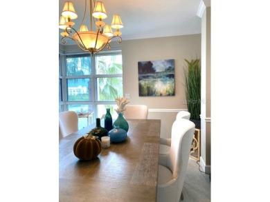 Enjoy luxury waterfront living in this premier fourth floor end