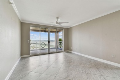 Enjoy luxury waterfront living in this premier fourth floor end