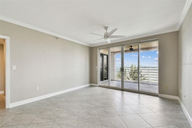 Enjoy luxury waterfront living in this premier fourth floor end