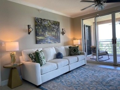 Enjoy luxury waterfront living in this premier fourth floor end