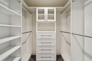 Enjoy luxury waterfront living in this premier fourth floor end