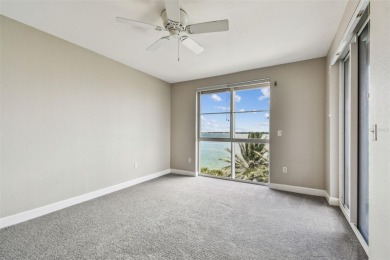 Enjoy luxury waterfront living in this premier fourth floor end