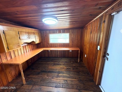 Country living located across the road from the Lake sits the