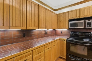 Discover lakeside living at its finest in this beautifully