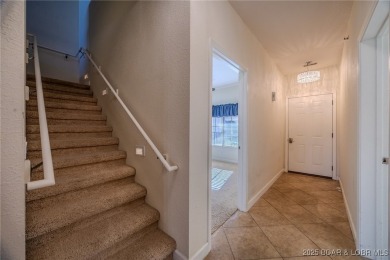 Discover lakeside living at its finest in the sought-after