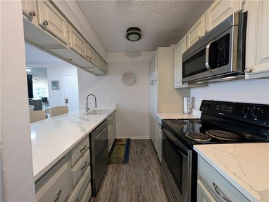 Discover waterfront living at Marina del Sol with Unit 1002C at