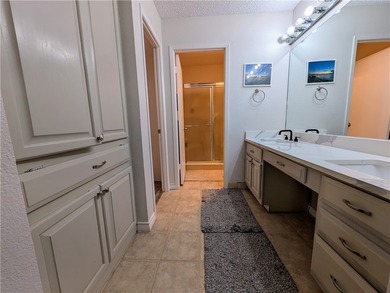 Discover waterfront living at Marina del Sol with Unit 1002C at