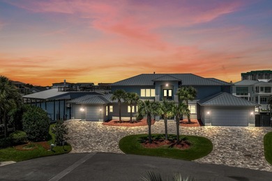 This canal-front home on Holiday Isle sits on a spacious corner