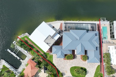 This canal-front home on Holiday Isle sits on a spacious corner