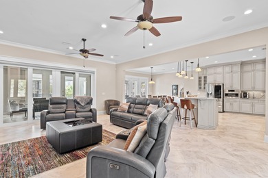 This canal-front home on Holiday Isle sits on a spacious corner