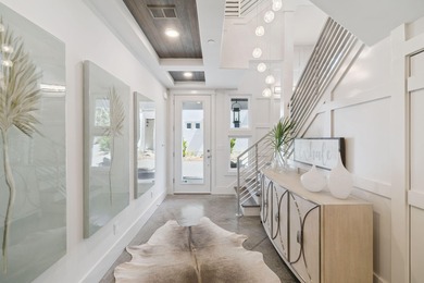 This luxurious home is located south of 30A at Caspian Estates