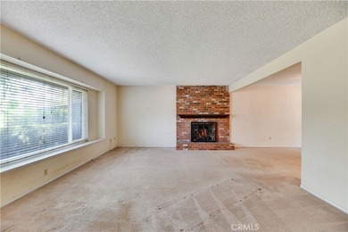 Welcome to this spacious 4-bedroom, 3-bathroom home in the