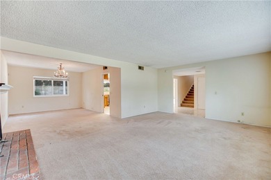 Welcome to this spacious 4-bedroom, 3-bathroom home in the