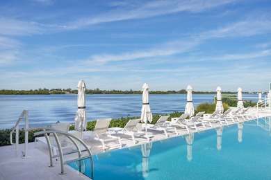 Experience breathtaking water views from this fully renovated