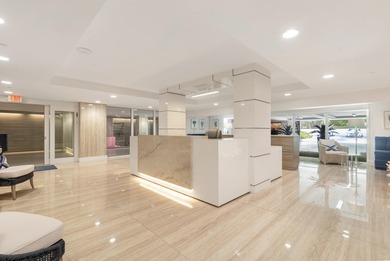 Experience breathtaking water views from this fully renovated