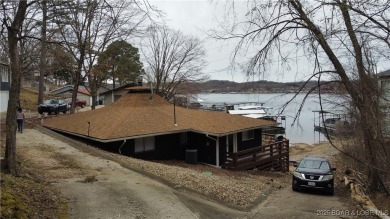 Completely remodeled in 2023, this 4BR/3BA lakefront home offers