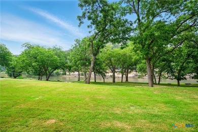 Guadalupe River?front living at its finest! Nestled in the gated