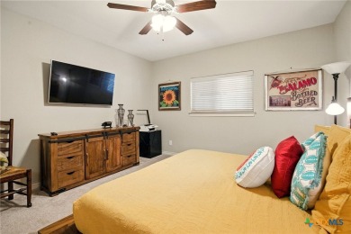 Guadalupe River?front living at its finest! Nestled in the gated