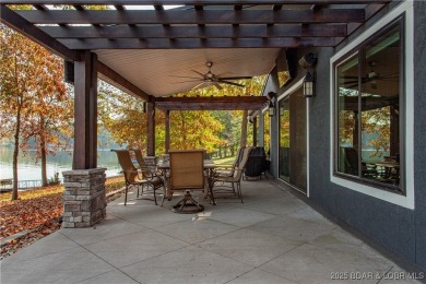 Lakefront living at its finest! This totally remodeled 5-bedroom